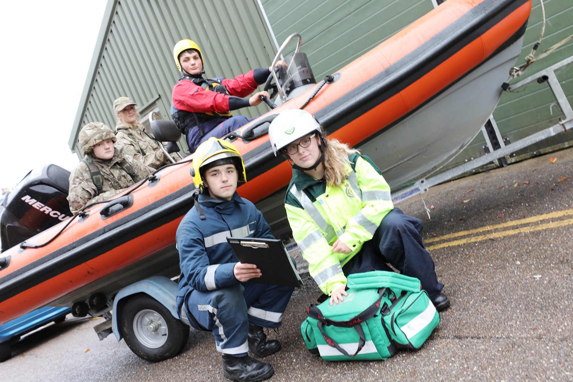 Military academy and protective services students in different uniforms